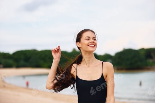 Preview: woman sea summer sunset travel young lifestyle beach smile running beauty