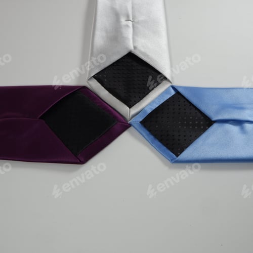 Preview: Three multi colored ties on a white background