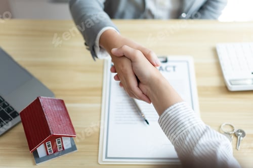 Preview: Insurance concept the chattel agent making a perfect deal of estate with his customer.