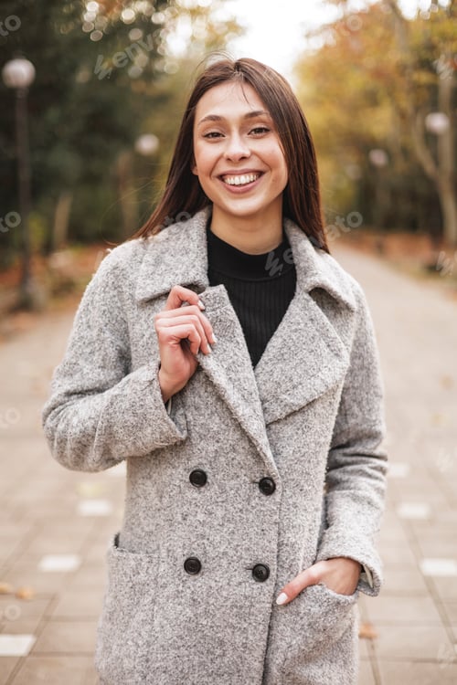 Preview: Portrait of cute young woman in park, brazilian ethnicity