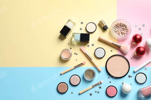 Preview: Flat lay composition with makeup products and Christmas decor on color background. Space for text