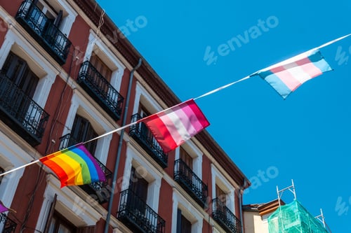 Preview: Lgbtq flags hanging in the streets and balconies at the pride party in Madrid, Spain