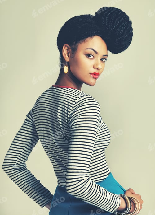 Preview: Glamour is a state of mind. Shot of a fashionable young woman posing in the studio.