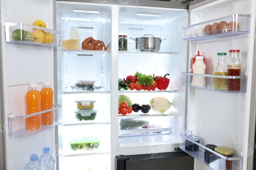 Preview: Modern open refrigerator full of different products