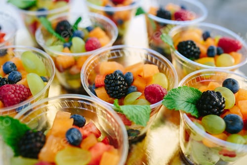 Preview: Closeup shot of fresh fruits in plastic cups