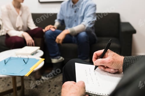 Preview: People in Discussion During a Meeting Indoors