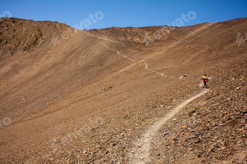 Preview: Biker Pushes His Bicycle Up In High Caucasus Mountains