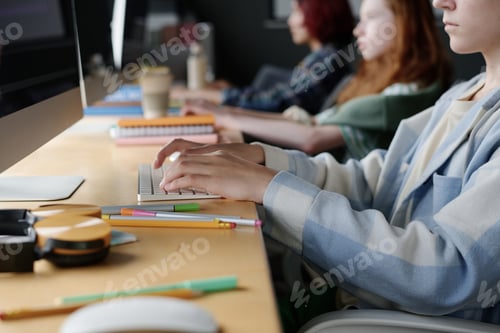 Preview: Student Typing On Computer In Class