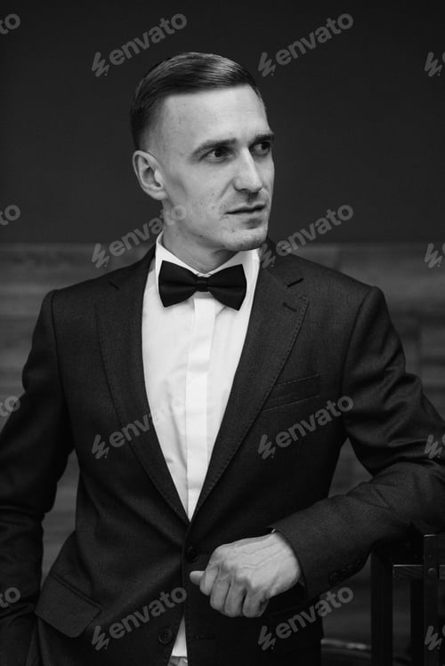 Preview: portrait of a young guy groom at the training camp in the barbershop