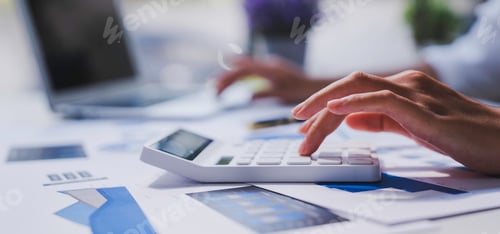 Preview: financial business woman calculating corporate income tax data and analyze financial stock charts th
