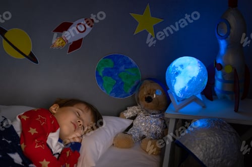 Preview: Happy child sleeping at home