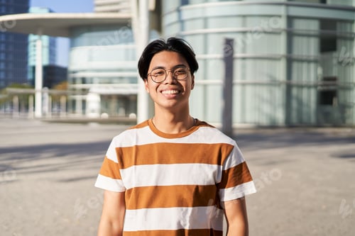 Preview: Happy asian Student. Guy smiling at camera outdoors on campus of university