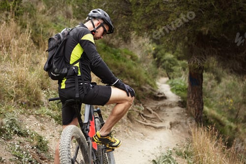 Preview: People, sports, extreme and travel concept. Young Caucasian male rider in cycling clothes having a f