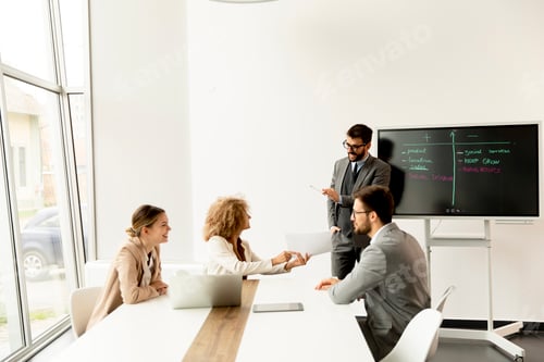 Preview: Multiethnic young business people working together in the office