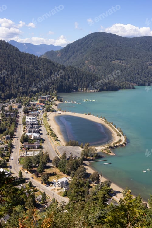 Preview: Small touristic town by the lake with Canadian Mountain Landscape