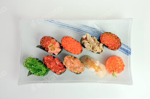 Preview: Japanese sushi of seaweed roll with Ikura, Ebiko, Hotate, Wakame, Kurage on ceramic plate