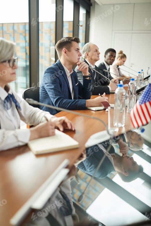 Preview: Business people at press conference