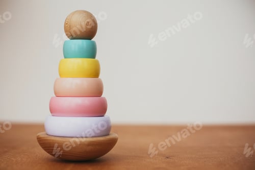 Preview: Stylish wooden toy for child on wooden table