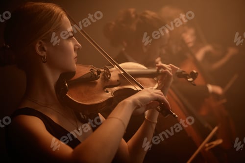 Preview: Talented Violinist Playing Music with Orchestra in Studio