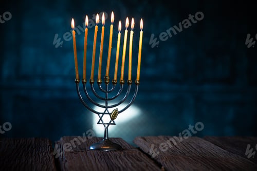 Preview: candles burning in menorah for Hannukah