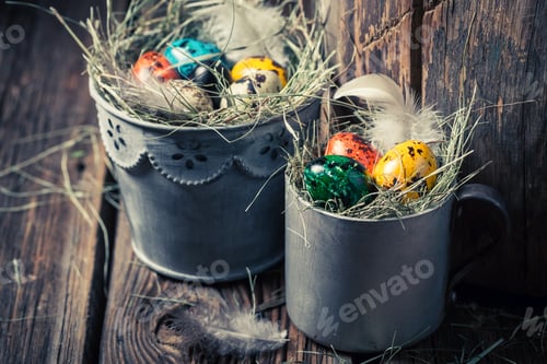 Preview: Quail and hen Easter eggs with hay in old mug