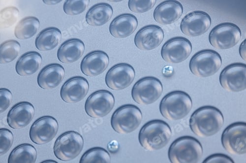 Preview: Close-up of surface with many small lamps in rows