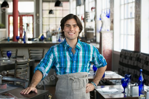 Preview: A cafe interior. A waiter in a checked shirt.