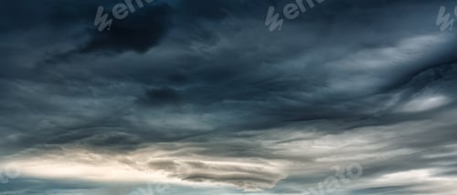 Preview: Dark dramatic sky with heavy cloud and storm formation in moody weather