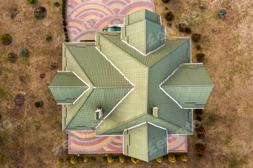 Preview: Aerial top view of new residential house cottage with shingle roof on fenced big yard on sunny day