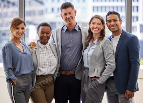 Preview: Shot of a diverse group of businesspeople standing close together in the office