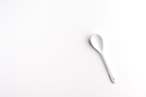 Preview: White spoon isolated on a white surface