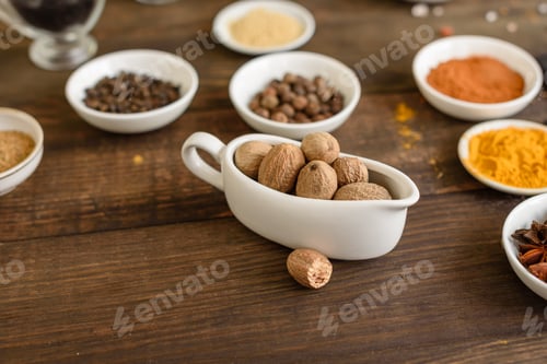 Preview: Spices and herbs on old kitchen table. Food and cuisine ingredients
