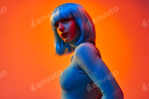 Preview: Young futuristic woman under neon light