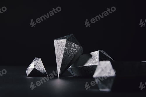 Preview: close-up view of beautiful faceted silver pieces on black