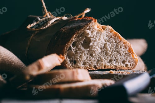 Preview: Rustic bread loaf on dark background