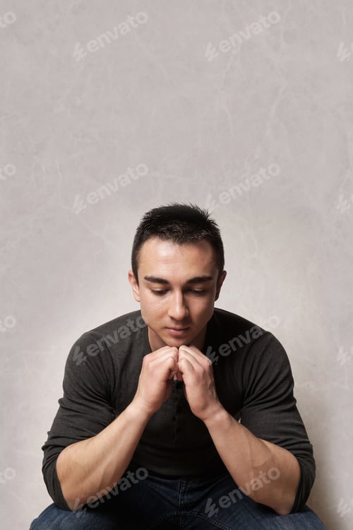 Preview: sad man looking down