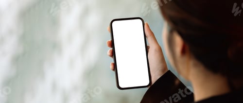 Preview: Close up view of a woman using smartphone, Blank screen mobile phone for graphic display montage.
