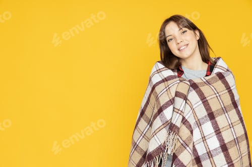 Preview: Attractive young woman on yellow background, place for text
