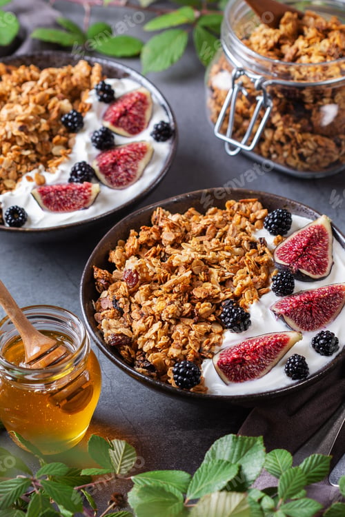 Preview: Homemade oat granola muesli with yogurt and berries for breakfast
