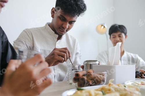 Preview: Muslim Man Making Hot Tea For Break Fast During Ramadan Feasting Month at Home