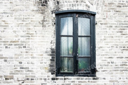 Preview: Grunge old brick wall with black window