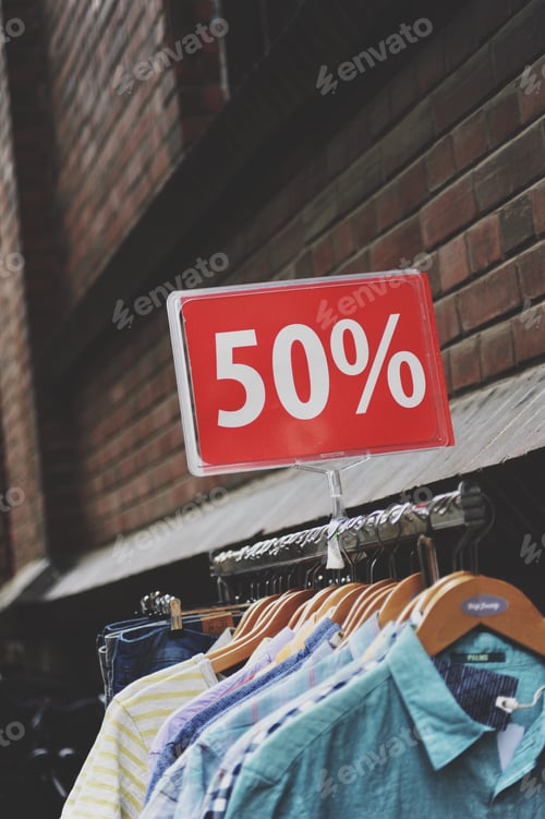 Clothing Rack Offering Fifty Percent Discount Sale