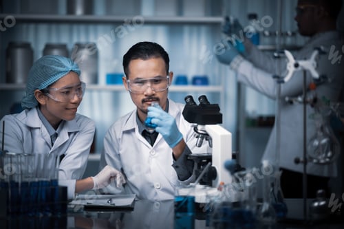 Preview: In a Modern Laboratory Scientists team Conduct Experiments, Consisting of glassware