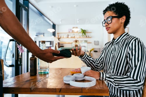Preview: Barista working in a bar cafeteria