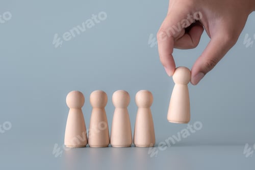 Preview: Wooden human figures leadership concept standing out from others