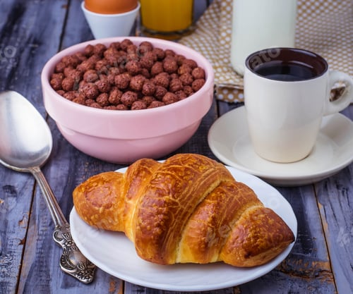 Preview: Croissant, cereal flake, coffee, milk, orange juice, boiled egg for breakfast