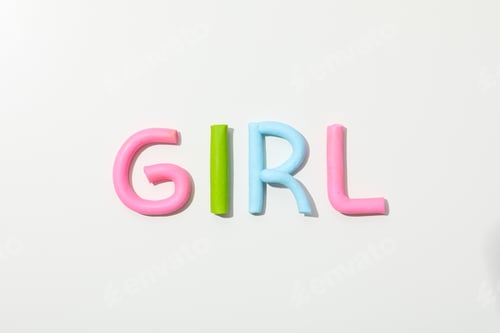 Preview: The word "girl" is made of colored plasticine on a white background.