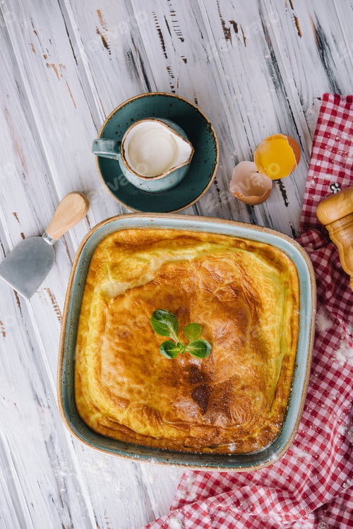 Preview: Delicious pie with meat and basil on wooden table, flat lay