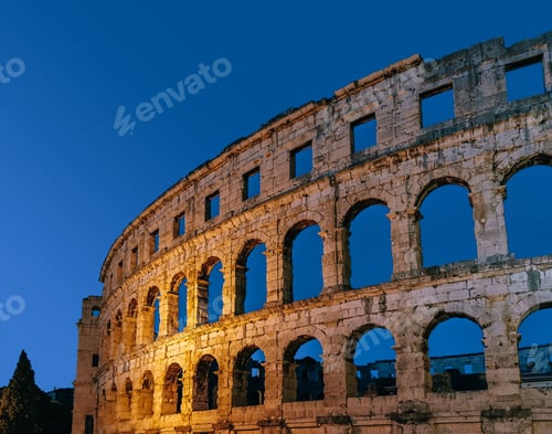 Preview: Low angle night photo of Beautiful ancient monument, the roman arena in Pula, Croatia.