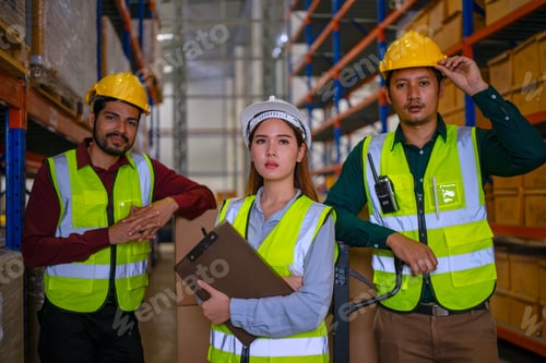 Preview: Blue collar workers are working at warehouse.